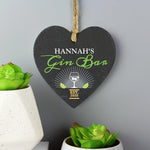 Slate hanging heart sign with natural, rustic string which can be personalised with a name of  your choice. A perfect gift for any Gin lover!  Personalise with a name up to 12 characters long (will appear in fixed upper case) and a year up to 4 characters. Gin Bar & EST is fixed text.