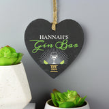 Slate hanging heart sign with natural, rustic string which can be personalised with a name of  your choice. A perfect gift for any Gin lover!  Personalise with a name up to 12 characters long (will appear in fixed upper case) and a year up to 4 characters. Gin Bar & EST is fixed text.