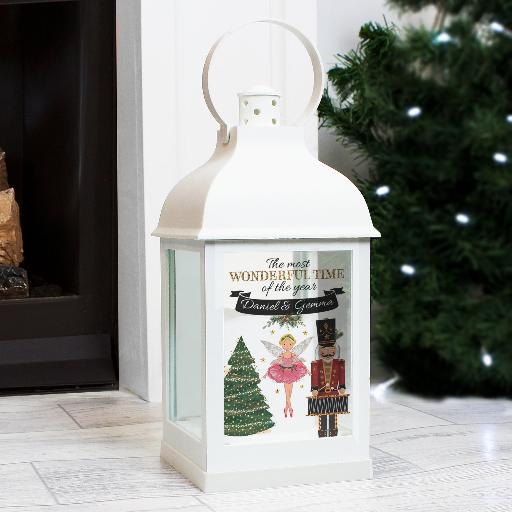 This beautiful personalised lantern will add to the magical festivities for you or your loved ones this Christmas. The battery-powered lantern has a realistic flickering warm orange flame effect, adding an ambient touch to any room. Hang this lantern around the home with the attached hanging hoop.   Personalise the lantern with 1 line of text up to 25 characters.  Requires x3 AAA batteries.