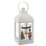 This beautiful personalised lantern will add to the magicical festivities for you or your loved ones this Christmas. The battery-powered lantern has a realistic flickering warm orange flame effect, adding an ambient touch to any room. Hang this lantern around the home with the attached hanging hoop.   Personalise the lantern with 1 line of text up to 25 characters.  Requires x3 AAA batteries.