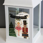 This beautiful personalised lantern will add to the magicical festivities for you or your loved ones this Christmas. The battery-powered lantern has a realistic flickering warm orange flame effect, adding an ambient touch to any room. Hang this lantern around the home with the attached hanging hoop.   Personalise the lantern with 1 line of text up to 25 characters.  Requires x3 AAA batteries.
