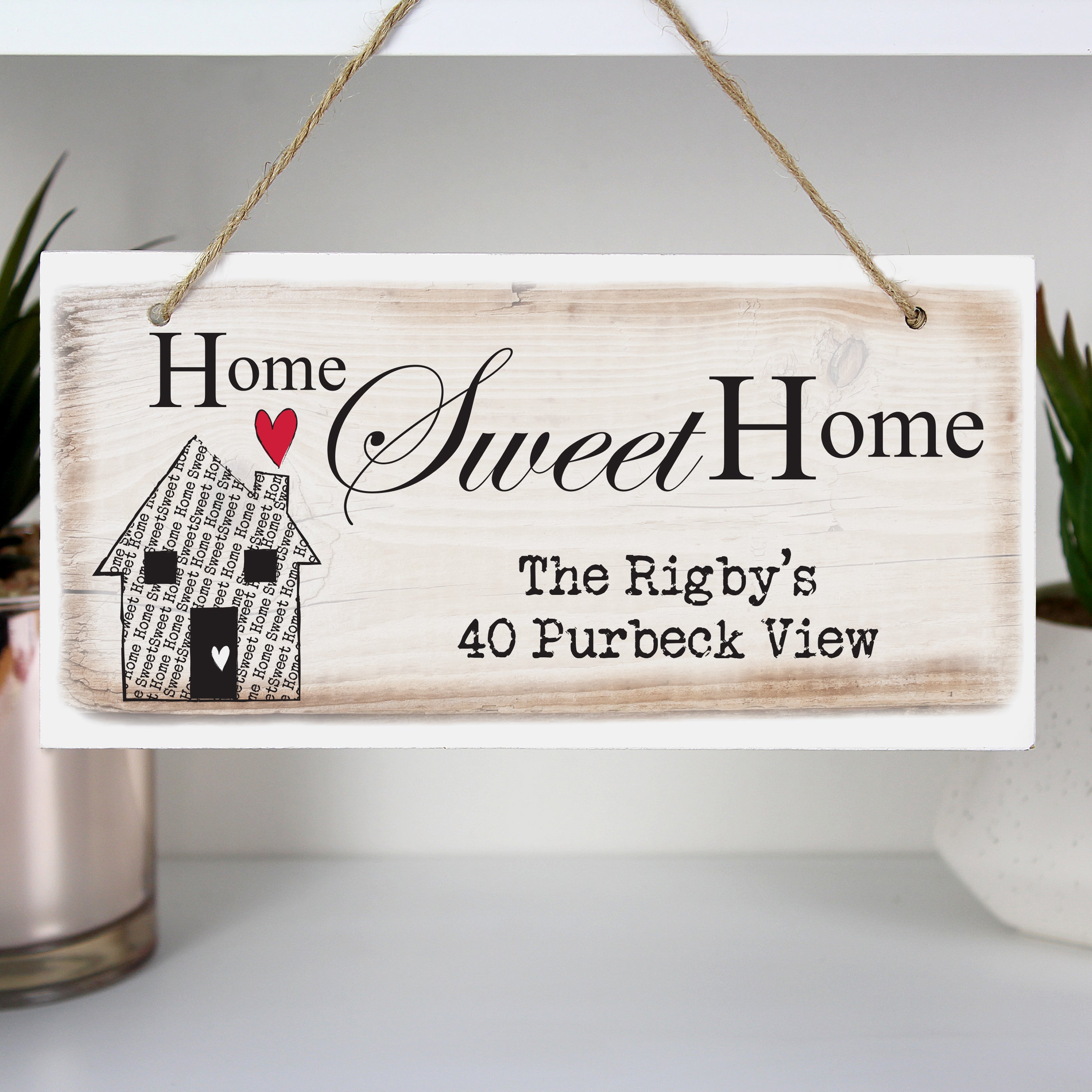 Wooden Hanging plaque which can be personalised with any message over two lines of 30 characters. 'Home Sweet Home' is fixed text.
