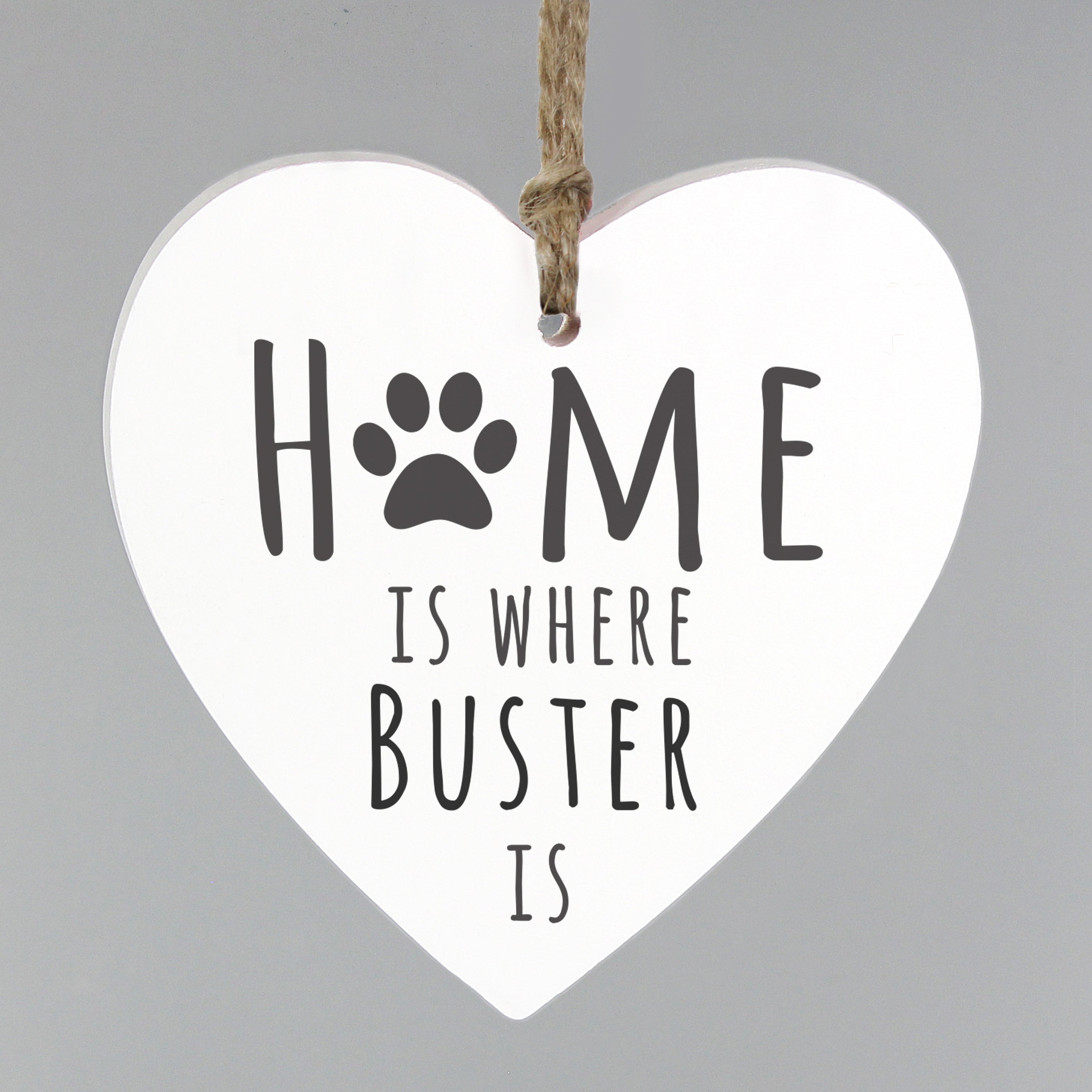 Personalised Pet wooden heart hanging decoration - create the perfect gift for all pet lovers.  Personalise this wooden heart decoration with a pet's name up to 12 characters. The personalisation will appear in fixed upper case. The words 'Home is where' and 'is' are fixed.
