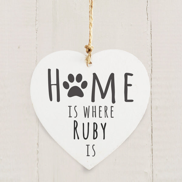 Personalised Pet wooden heart hanging decoration - create the perfect gift for all pet lovers.  Personalise this wooden heart decoration with a pet's name up to 12 characters. The personalisation will appear in fixed upper case. The words 'Home is where' and 'is' are fixed.