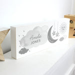 Adorable personalised moon & stars wooden block decoration, a fabulous way of welcoming a new baby to the world.  This sign can be personalised with a first name with 12 characters which is case sensitive and surname with 12 characters which is fixed upper case (on cloud). Date: 20 characters (on moon) Fixed upper case. Weight:  4 characters (on left star) and 4 characters (on right star) Case sensitive. Time : 5 Characters (on sun) with AM/PM Fixed upper case.