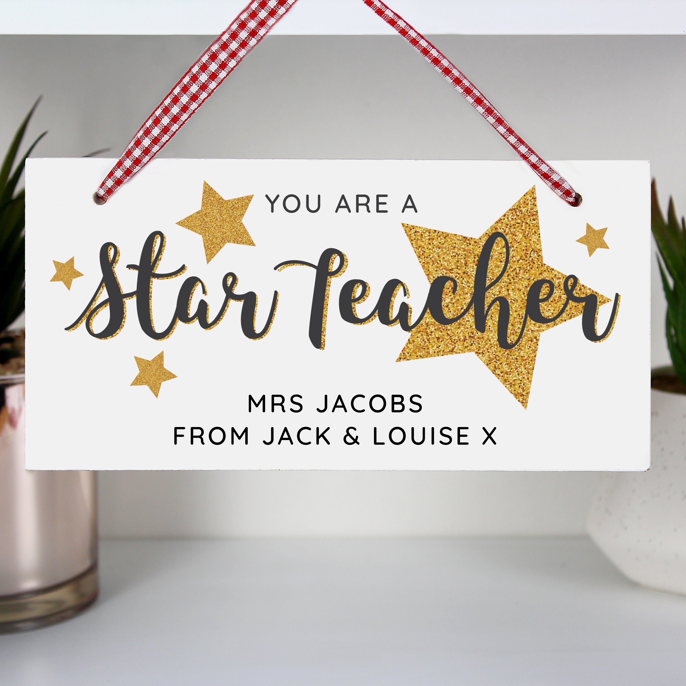 Beautiful wooden hanging sign 'Star Teacher' would make a lovely gift for all the teachers out there.  Personalise this decoration with a name up to 20 characters long and a message with up to 20 character. 'You are a star teacher' is fixed text and cannot be changed.  The personalisation will appear in fixed upper case.