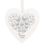 Wooden Hanging Heart with beautiful family tree design which can be personalised with  up to 9 family members.  Personalise with family surname up to 20 Characters and names (1 to 9) up to 12 characters per name. The text will appear as entered.