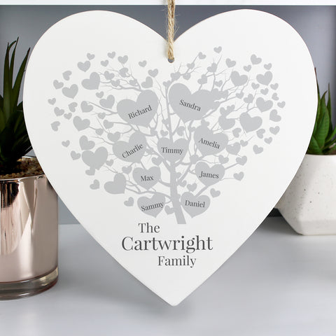 Wooden Hanging Heart with beautiful family tree design which can be personalised with  up to 9 family members.  Personalise with family surname up to 20 Characters and names (1 to 9) up to 12 characters per name. The text will appear as entered.