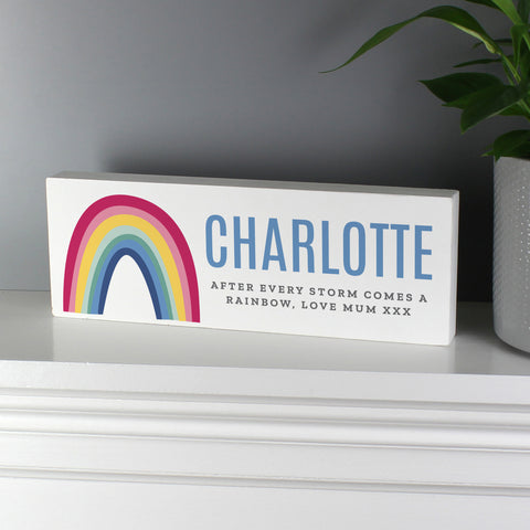 Freestanding wooden sign with bright rainbow design which can be personalised with a name up to 12 characters and your own message over 2 lines up to 25 characters per line including spaces and punctuation.