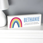 Freestanding wooden sign with bright rainbow design which can be personalised with a name up to 12 characters and your own message over 2 lines up to 25 characters per line including spaces and punctuation.
