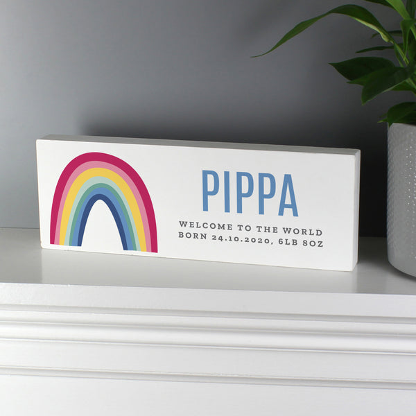 Freestanding wooden sign with bright rainbow design which can be personalised with a name up to 12 characters and your own message over 2 lines up to 25 characters per line including spaces and punctuation.