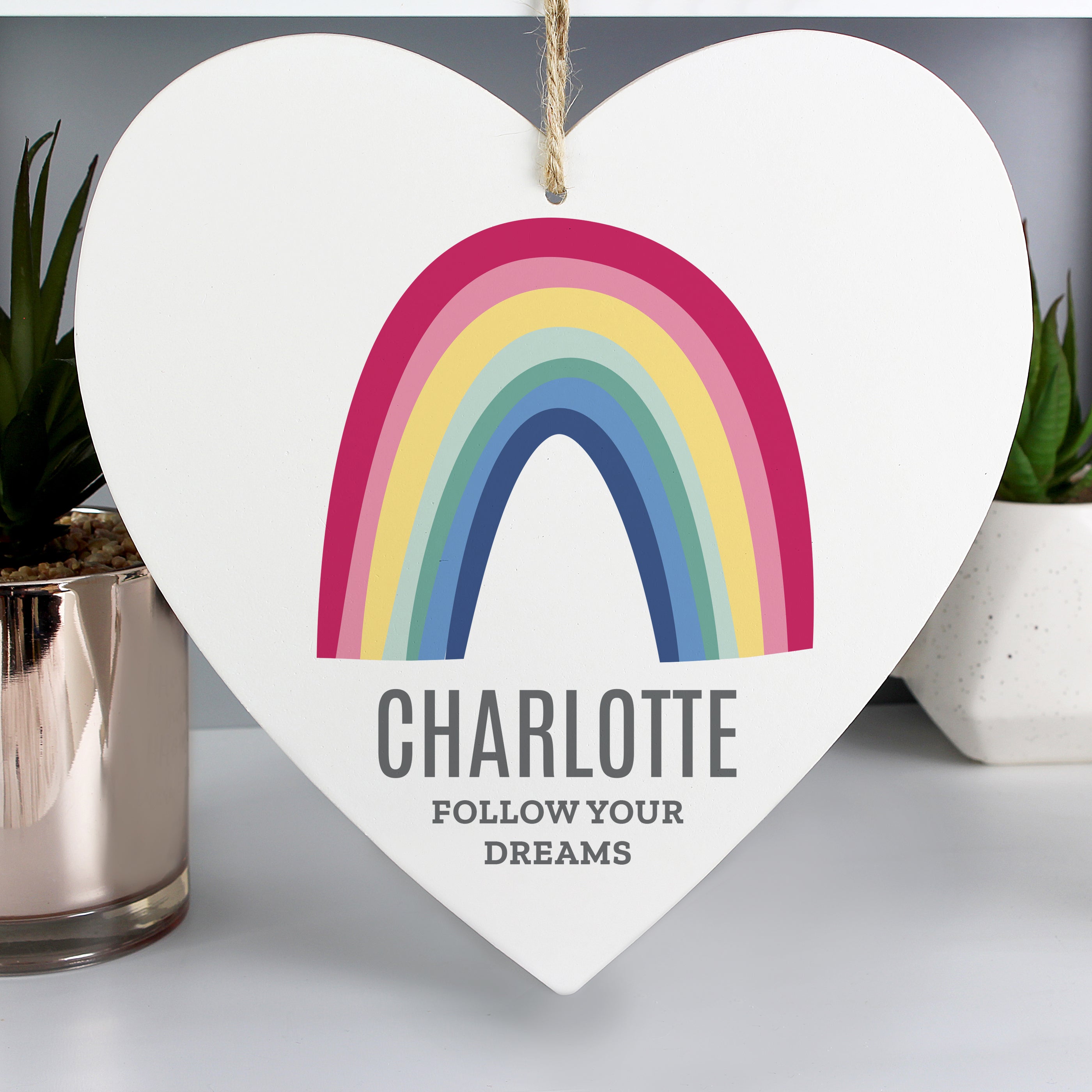 Wooden Hanging Heart with bright rainbow design which can be personalised with a name up to 12 characters and a message with up to 2 lines of 20 characters.