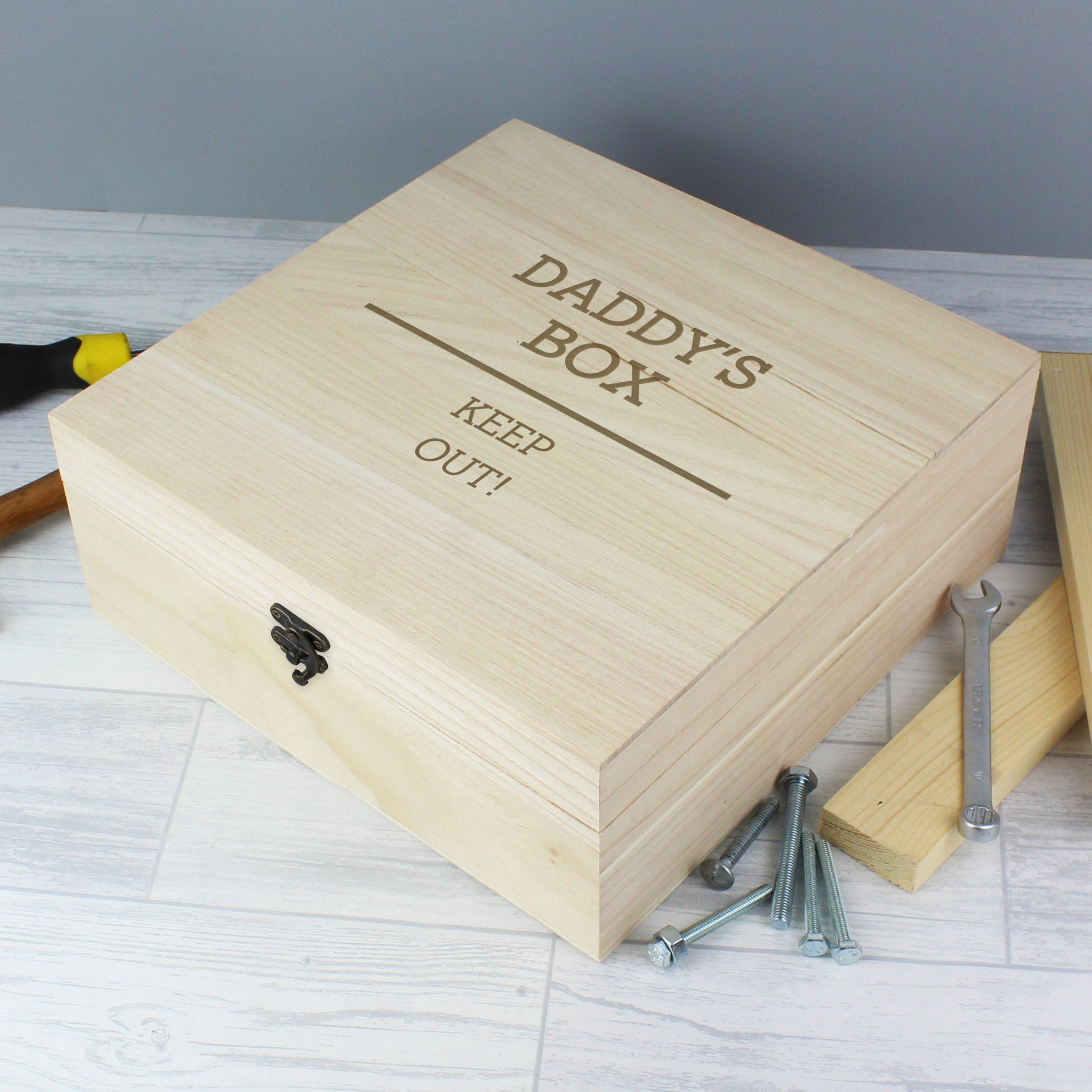 Quirky wooden keepsake box to keep clutter at bay or store those special keepsakes featuring a metal clasp and hinges.  The box can be personalised with 2 lines of text with up to 15 characters per line (above the line) and 2 lines of text with up to 25 characters per line (below the line).