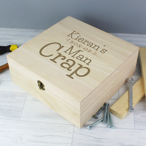 Quirky wooden keepsake box to keep his clutter at bay featuring a metal clasp and hinges. The box can be personalised with a name up to 12 characters long and will appear as entered.  It has the fixed text:  'box of man crap'