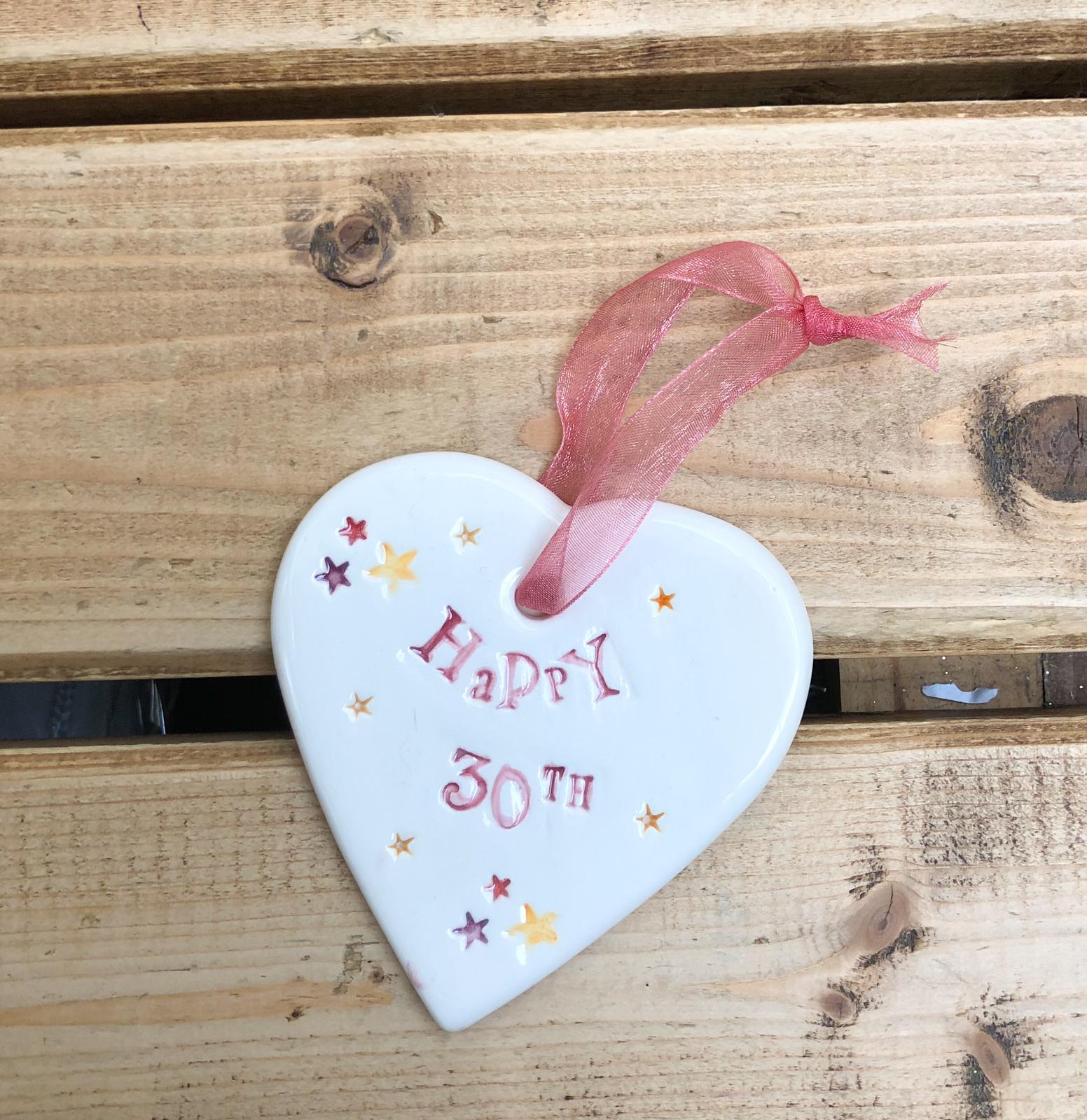 Hand painted ceramic heart featuring star design and the sentiment 'Happy 30th'  Handmade in the UK using clay, glaze and paint sourced locally.  Material:  Ceramic
