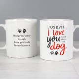 Personalised mug features the text "I love you more than the dog" on the front in red and black text with cute paw print design