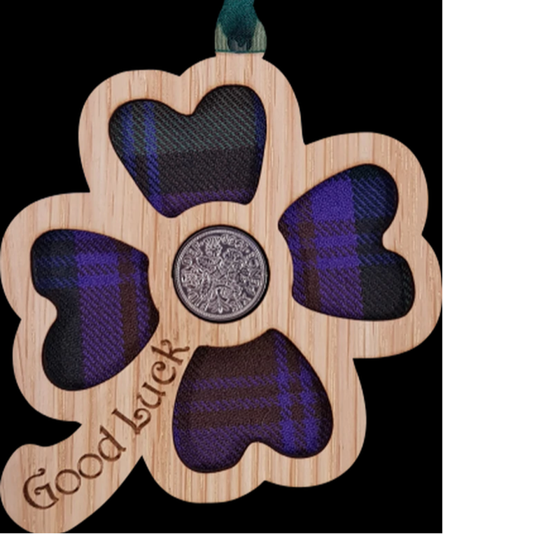 A unique keepsake gift with a Scottish twist.  The sixpence is mounted onto a hanging oak veneered wooden clover with tartan inserts, mounted on card and packaged in clear cellophane packets.  A lucky sixpence is traditionally believed to bring good luck with some families passing down the same sixpence through generations.