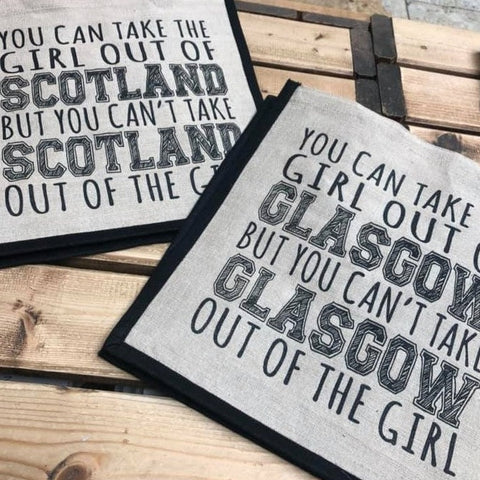 premium quality juco shopping bag with a short handle, features printed slogan 'You can take the girl out of Scotland but you can't take Scotland out of the girl'