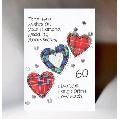 ***Price Includes Delivery ***  Scottish Diamond Anniversary Card with three tartan hearts and the words:   'Three Wee Wishes on Your Diamond Wedding Anniversary    Live Well, Laugh Often, Love Much'  Designed and printed in Scotland  Textured White Card  Dimensions: 15cm x 10.5cm  We can send direct to recipient free of charge including a handwritten message inside .... simply add a note to your order (from cart page) including your message.  