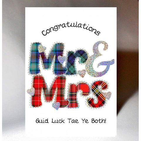  ***Price Includes Delivery ***  Scottish Wedding Card Mr and Mrs in Tartan.  Blank inside  Designed and printed in Scotland  Textured White Card with Holo Foil Highlight  Dimensions: 10.5cm x 15cm  We can send direct to recipient free of charge including a handwritten message inside .... simply add a note to your order (from cart page) including your message.  