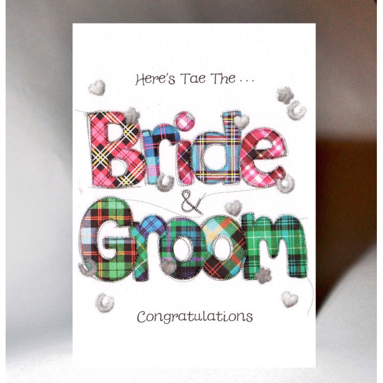 ***Price Includes Delivery ***  Scottish Wedding Card with the words 'Here's tae the Bride and Groom Congratulations.  The Words 'Bride and Groom' are featured in a colourful tartan.  Blank inside  Designed and printed in Scotland  Card embossed with transparent foil highlight  Dimensions: 10.5cm x 15cm  We can send direct to recipient free of charge including a handwritten message inside .... simply add a note to your order (from cart page) including your message.