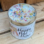 Tin happy new home candle with added sparkles