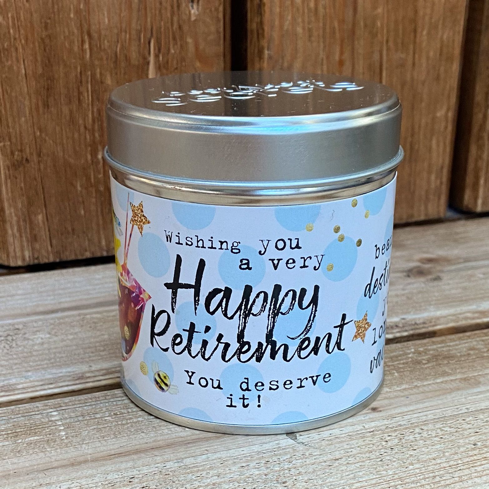 Tin happy retirement candle with added sparkles