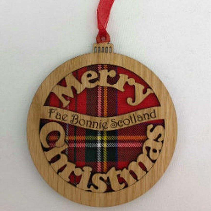 A unique keepsake Christmas decoration with a Scottish twist.  A wooden Christmas Bauble with tartan inserts and the sweet sentiment 'Merry Christmas fae Bonnie Scotland', mounted on card and packaged in clear cellophane packets.