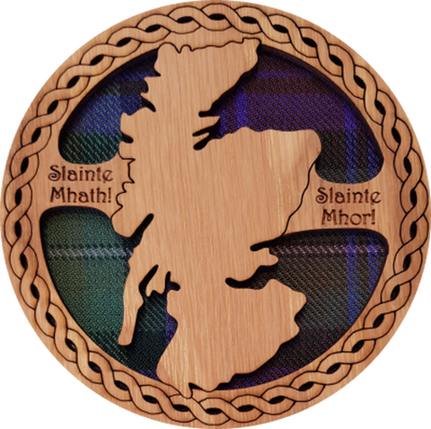 Round wooden coaster with tartan insert and cut out map of Scotland.  The coaster features the inscription:  'Slainte Mhath!' and 'Slainte Mhor!' meaning 'Good Health!' 'Great Health!'