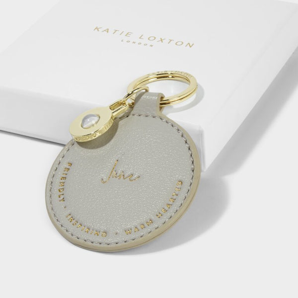 This beautiful keyring from much loved brand Katie Loxton with pretty Moonstone charm, comes in a beautiful pale grey colour which features the golden embossed month 'June' and three traits that perfectly reflect those born in this month - friendly, inspiring and warm hearted!