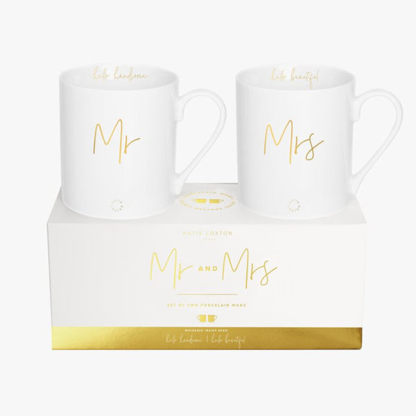 The stylish white and gold mug set from much loved brand Katie Loxton with sweet sentiment 'Mr & Mrs' will make the perfect gift for the newly married couple.  The Mr mug is finished with the sentiment 'hello handsome' on the inside and the Mrs mug is finished with the sentiment 'hello beautiful' inside.  This set comes beautifully gift boxed. 
